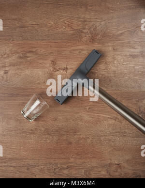 Cleaning wooden floor from water spill above top view Stock Photo