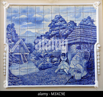 Azulejo of The Ritz Cafe. Ceramic glazed blue tiles depicting rural scene. Around 1908. Funchal, Madeira Island. Stock Photo