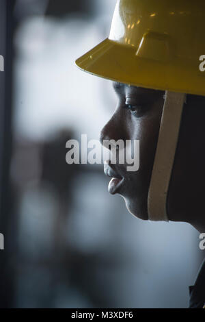 180118-N-UG232-0099 PACIFIC OCEAN (Jan. 18, 2018) Boatswain's Mate 3rd Class (SW) Emmanual Morgan, from Lawrenceville, Ga. awaits deployment of the Orion test article on board the San Antonio Class amphibious transport dock USS Anchorage (LPD 23). Anchorage is underway to support NASA's Orion spacecraft Underway Recovery Test 6 (URT-6). (U.S. Navy Combat Camera photo by Chief Mass Communication Specialist Martin Wright) Stock Photo