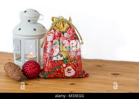 Red gift bag with white lantern for christmas Stock Photo