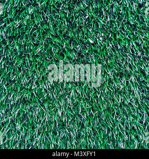 Green grass. natural background texture. Artificial is not real plastic grass. Stock Photo