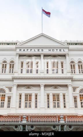 The main facade of the iconic Raffles Hotel in Singapore. Stock Photo