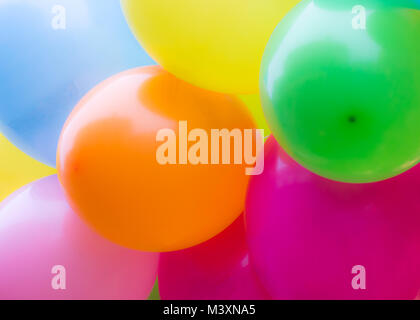 A bunch of colorful balloons with selective focus Stock Photo