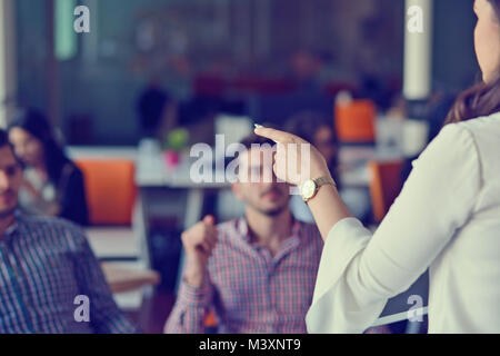 Group Young Coworkers Making Great Business Decisions.Creative Team Discussion Corporate Work Concept Modern Office. Stock Photo