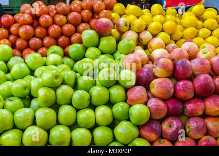 Apples, lemons and tomatoes for sale at a market in Santiago de Chile Stock Photo
