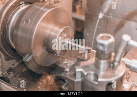 Motion Blur Metal Lathe, Lathe machine Metalworking in workshop Stock Photo