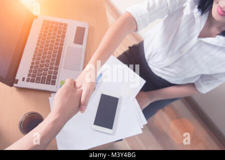 Business handshake at office corporate meeting, contract conclusion and successful agreement concept,shaking hands after successful meeting business P Stock Photo