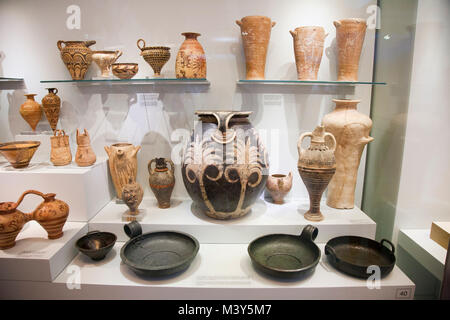 Bronze utensilis and clay vassels from Knossos Palace and houses dated 1700-1450 BC, Archaeological Museum of Heraklion, Iraklio, island of Crete, Gre Stock Photo