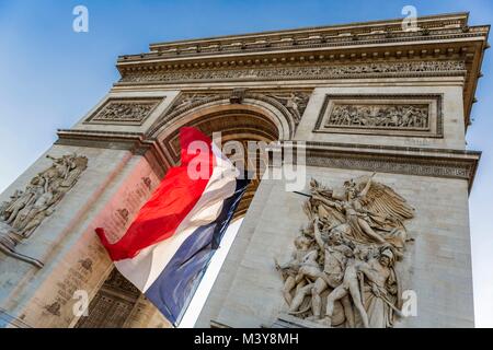 France, Paris, the French flag under the Arc de Triomphe Stock Photo