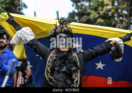 Caracas, Miranda, Venezuela. 12th Feb, 2018. A venezuelan flag being displayed.Remembrance service held in Caracas in honor of those killed during the protests in Venezuela. Group of people marched to the eastern cemetery with relatives of the victims who have died protesting since 2014. Credit: RomÃ¡N Camacho/SOPA/ZUMA Wire/Alamy Live News Stock Photo