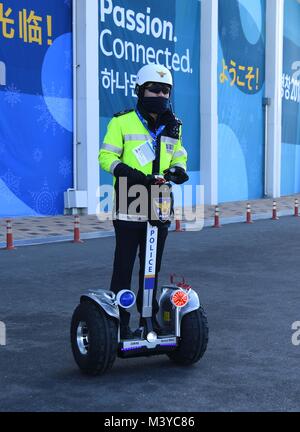 Gangneung. Republic of Korea. 12th Feb, 2018. Policeman on a segway patrols around the park. Around the Gangneung Olympic park. Pyeongchang2018 winter Olympics. Gangneung. Republic of Korea. 12/02/2018. Credit: Sport In Pictures/Alamy Live News Stock Photo