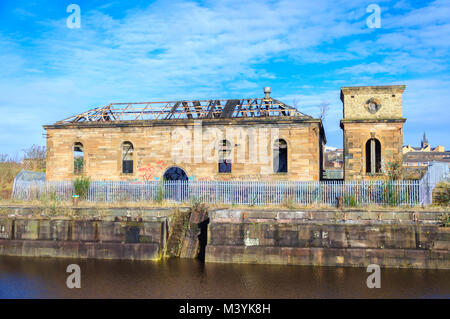 Glasgow, Scotland, UK. 13th February, 2018. UK Weather. Sunshine in Glasgow at the Pump House in Govan Graving Docks which were built between 1869 and 1898 using cut basalt rock and have been granted A-Listed building status. Credit: Skully/Alamy Live News Stock Photo