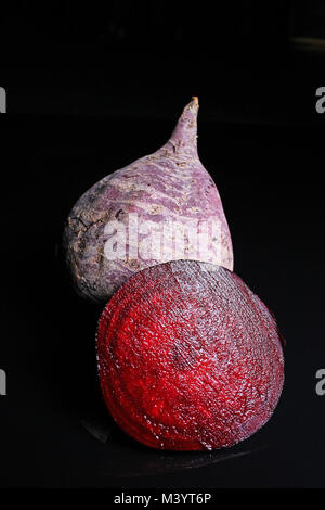 Beetroot beet on black reflective studio background. Isolated black ...