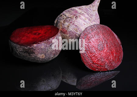 Beetroot beet on black reflective studio background. Isolated black ...