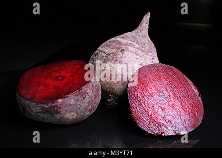 Beetroot beet on black reflective studio background. Isolated black ...