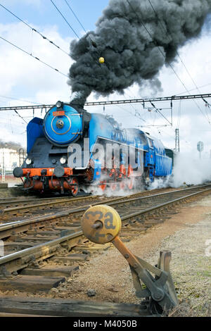 PRAGUE, CZECH REPUBLIC - FAB 13, 2018:  steam locomotive Albatros 498.022, Prague railway station Smichov, Czech republic. Tourist sightseeing train t Stock Photo