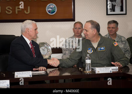 Vice President of the United States Michael R. Pence greets Lt. Gen. Jerry P. Martinez, Commander of United States Forces Japan, during a meeting with USFJ leadership, Feb. 6, 2018, at Yokota Air Base, Japan. While in Japan, Pence visited Japanese officials including Prime Minister Shinzo Abe, meet with troops, and address Yokota Air Base service members before heading to South Korea for the PyeongChang 2018 Winter Olympics. (U.S. Air Force photo by Senior Airman Donald Hudson)