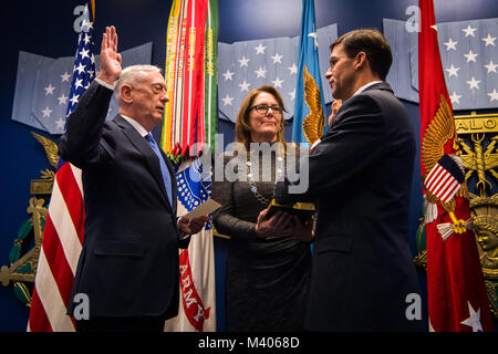 Secretary of Defense James N. Mattis officially welcomed back Army Secretary Dr. Mark T. Esper into the service that raised him during a swearing-in ceremony held in the Pentagon Friday, Jan. 5, 2018. Stock Photo