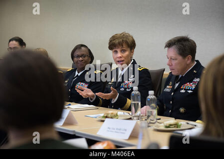 Lt. Gen. Nadja West, Army surgeon general and commander of U.S. Army Medical Command, answers questions about her Army life before a panel of fellow peer general officers and several congressional staff delegates during the Women Leadership Roundtable Discussion hosted at the Pentagon, Feb. 7, 2018. Top U.S. military generals met with congressional delegates to discuss their life perspectives as military women and the importance of having access to every talented American who can add strength to the force. (U.S. Army Reserve photo by Maj. Valerie Palacios) Stock Photo