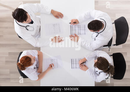 Elevated View Of Doctors Making Discussion Together Stock Photo