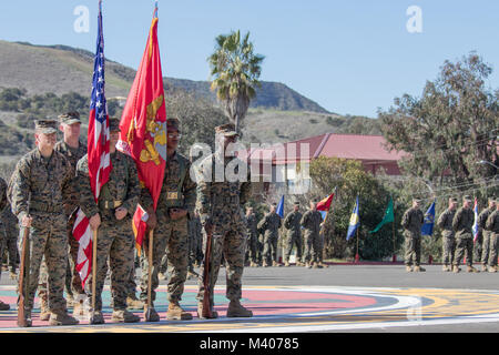 U.S. Marines with School of Infantry-West, Camp Pendleton, Calif., participate in a relief and appointment ceremony, Feb. 8, 2018. The ceremony was held to appoint Sgt. Maj. Jonathan L. Groth as the new sergeant major for School of Infantry-West. (U.S. Marine Corps photo by Cpl. Andre Heath) Stock Photo