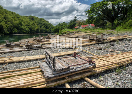 Bamboo rafts in the landscape awaiting tourists, Portland parish, Jamaica, West Indies, Caribbean Stock Photo