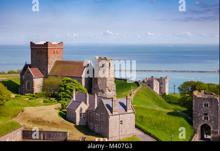 St Mary in Castro saxon church and Roman lighthouse (pharos) converted to the church bell-tower in the grounds of Dover Castle, Kent, Southern England Stock Photo