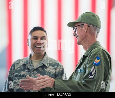 Jeff Intemann, a Vietnam Veteran from Vacaville, Calif., speaks with U.S. Air Force Chief Master Sgt. Marcos Malacara of the 60th Diagnostics and Therapeutics Squadron during the 75th Anniversary kickoff celebration at Travis Air Force Base, Calif., Feb. 8, 2018. The celebration featured the inaugural unveiling of the 75th Anniversary logo on a C-17 Globemaster III. Travis is celebrating 75 years as a major strategic logistics hub for the Pacific and integral part of global power projection for the total force. (U.S. Air Force photo by Louis Briscese)
