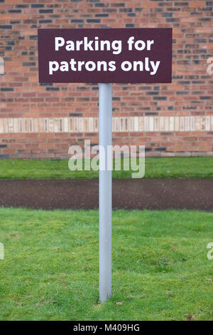 Parking for patrons only sign in private car park Stock Photo