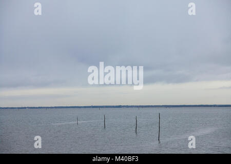 Atlantic ocean in Gujan Mestras, Bassin d'Arachon, France, during a storm on a cloudy rainy afternoon. This place is famous for its oyster parks and i Stock Photo
