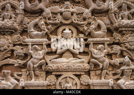 Wooden carved torana, Nepalese traditional door lintel. Thamel, Kathmandu, Nepal Stock Photo