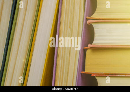 stack of books different colors. Education background. Back to school. Toned. Stock Photo