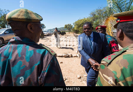 Mr. Christopher Mulenga, the Zambian Deputy Minister of Defense, shakes hands with members of the Zambian Defense Force during Exercise Southern Accord 2015 in Lusaka, Zambia on March 4, 2015. The annual exercise provides U.S. Military, United Nation allies and the Zambian Defense Force an opportunity to work and train together as a combined joint peacekeeping allied force. (U.S. Army Africa photo by Staff Sergeant Brian Kimball) 150804-F-QP401-042 by DoD News Photos Stock Photo