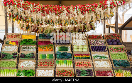 big choice of fresh vegetables on market. Exquisite display of fresh vegetables Stock Photo
