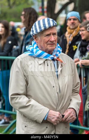 Warsaw, Poland - April 19th, 2016: Former Nazi concentration camps prisoner during a ceremony at the Warsaw Ghetto Heroes Monument. Stock Photo