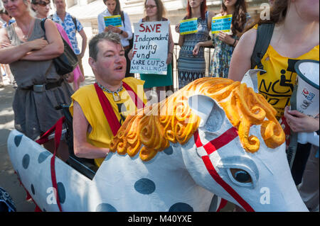 John Kelly, as Schimmel, the equine star and proud battle horse of the Graeae Theatre Company’s Threepenny Opera at DPAC's ILF closing ceremony and march for independent living Stock Photo