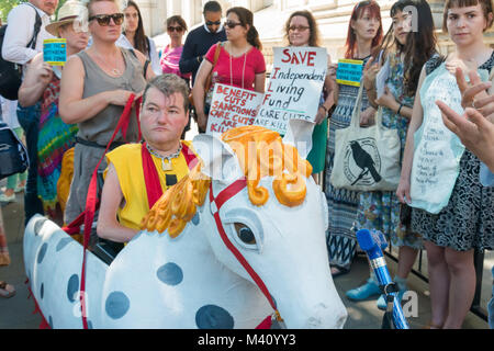 John Kelly, as Schimmel, the equine star and proud battle horse of the Graeae Theatre Company’s Threepenny Opera at DPAC's ILF closing ceremony and march for independent living Stock Photo