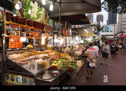 Kuala Lumpur, Malaysia - December 22 2017: Tourists and locals wander along Jalan Alor famous for its chinese food restaurant and street food stalls n Stock Photo