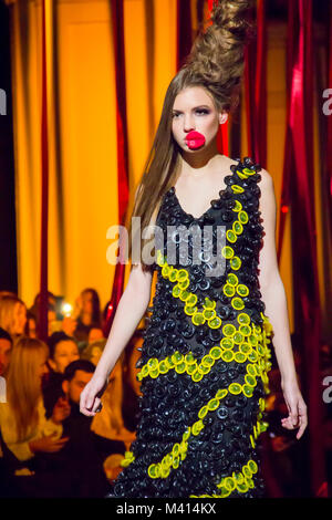 Model presents Oleksiy ZALEVSKIY's collection of clothes made from condoms during the 40th Ukrainian Fashion Week at Mystetsky Arsenal in Kyiv Stock Photo