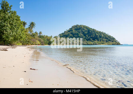Panoramic coast view, Banana tree, palms and rainforest plants, hills and blue sea. Nature in Asia. Thailand, The island Koh Chang Stock Photo