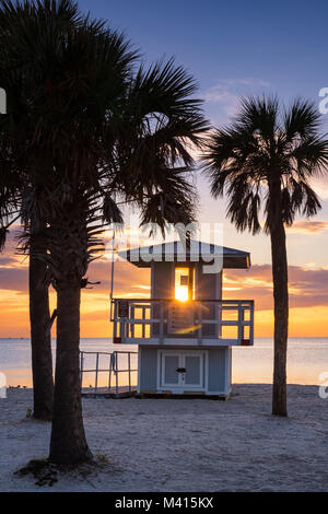 Sunset on the Gulf of Mexico along a lifeguard shack in Fred Howard Park, Tarpon Springs, Florida Stock Photo