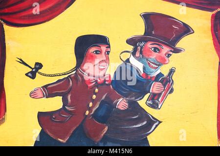 Lyon, France - July 14, 2015: Guignol and Gafron puppets on a wall. Guignol is a symbol of the city of Lyon Stock Photo