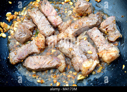 steak piece of meat fired with garlic and spicy Stock Photo