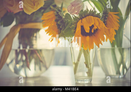 Still life with a different bouquets in vases. Bridal bouquet. Birthday Stock Photo