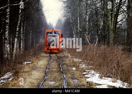 old very dangerous rickety railroad. train rides on rails deformed Stock Photo