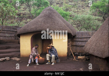 South Africa. Near Pretoria. Men of Sotho tribe using kalabas for drinking. (original from Lesotho). Stock Photo