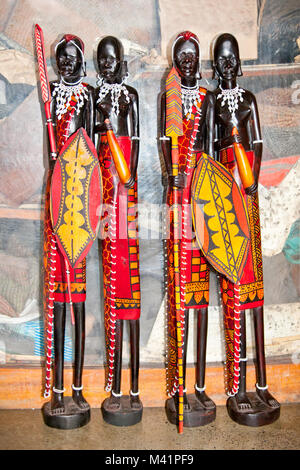 African handcraft dark wood carved people figures. Kenya, Africa. Stock Photo