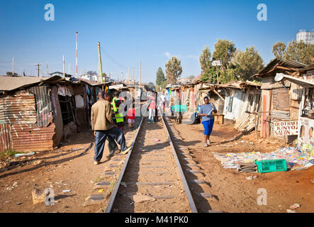 NAIROBI, KENYA - FEBRUARY 6, 2014: Review of daily life of local people Kibera slums on February 6, 2014. Nairobi, Kenya. Kiber is the largest slum in Stock Photo