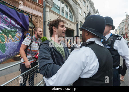 Scuffles and arguments continued for some minutes between protesters and police who had lost control of the situation, but after a few minutes reinforcements arrived. Stock Photo