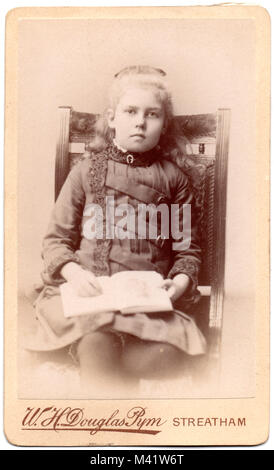 Constance Jupp, born 1877; photograph made circa 1885 On the reverse of the studio card is printed: 'Douglas Pym FRPS, Belle Vue Studios, Streatham, S.W.'  Connie would have been about 8 when this formal studio portrait was made. Stock Photo